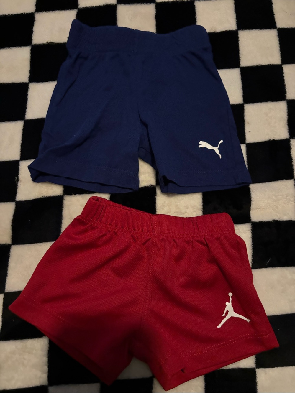 0/3 month puma and Jordan shorts
